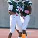 Eastern Michigan sophomore Javonti Greene celebrates a touchdown with teammate senior Trey Hunter during the first half against Western Michigan at Rynearson Stadium on Saturday afternoon. Melanie Maxwell I AnnArbor.com